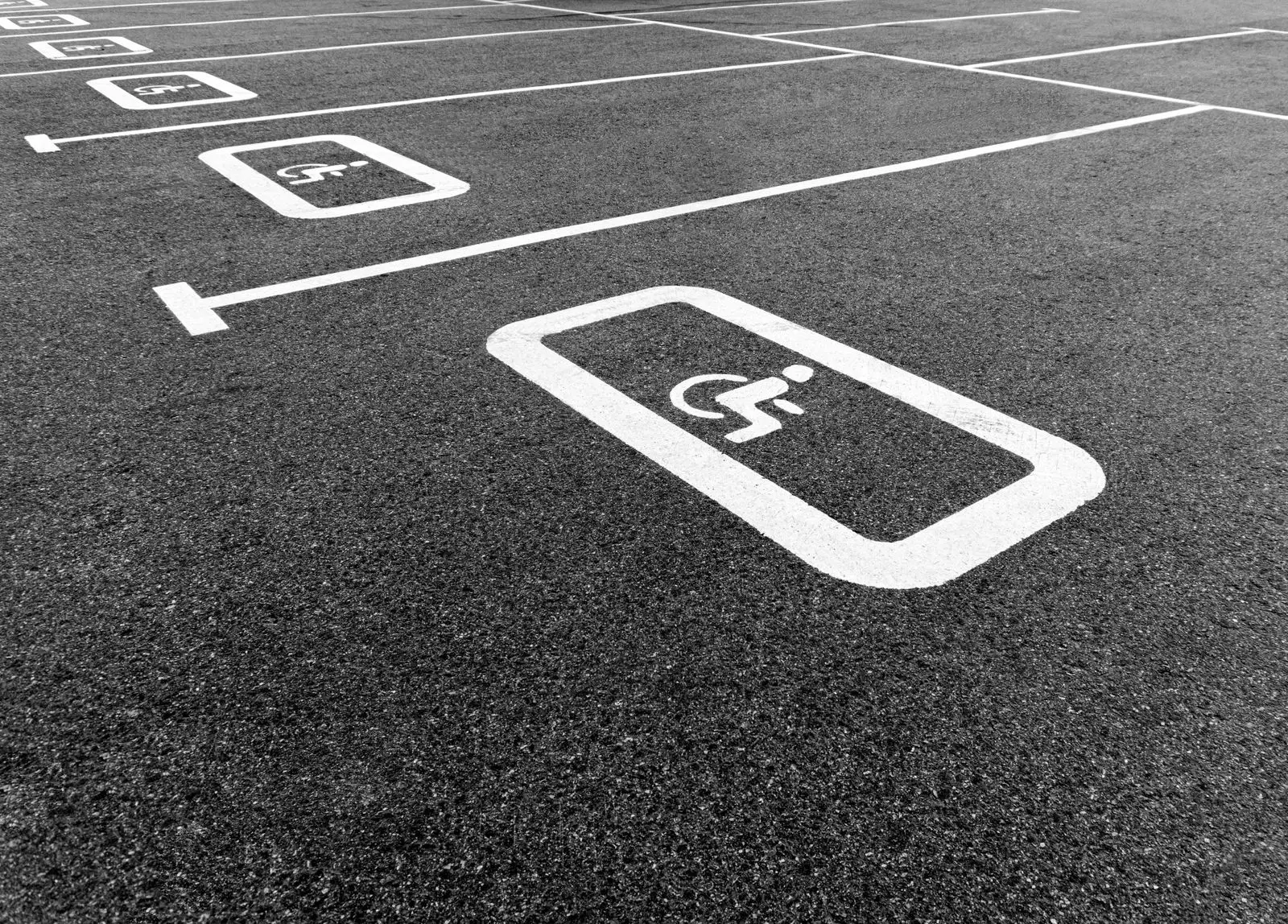 Accessible parking spaces marked with striping and symbols