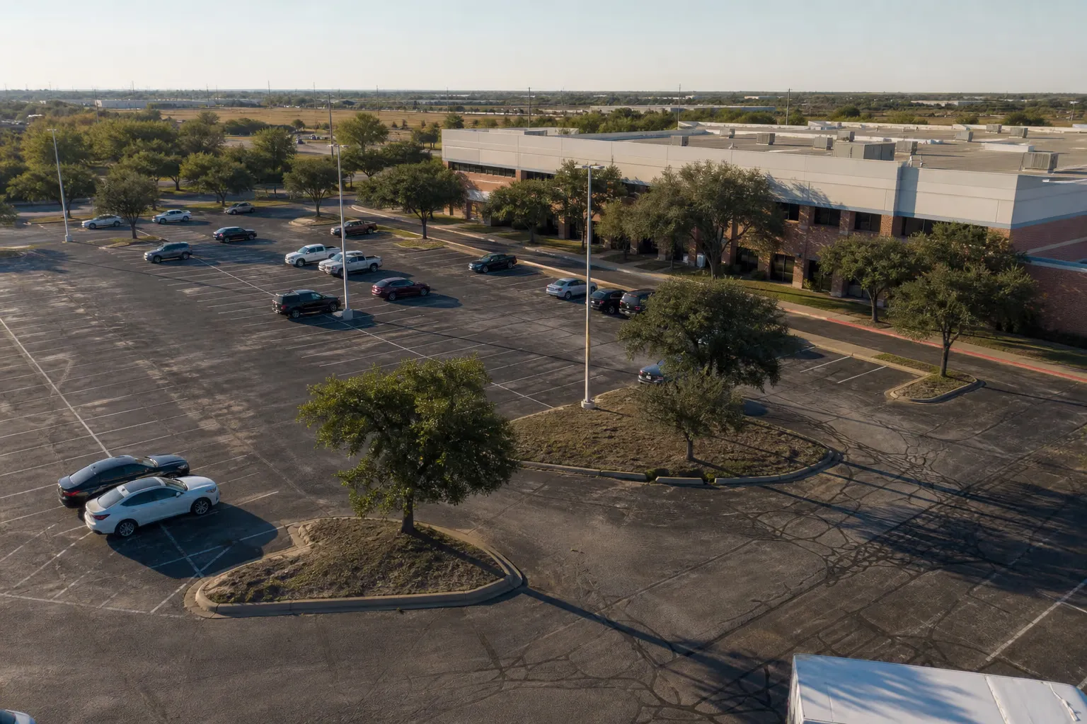 Aerial view of a large commercial parking lot in Dallas-Fort Worth